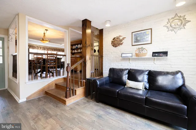 a bedroom with furniture and a fireplace