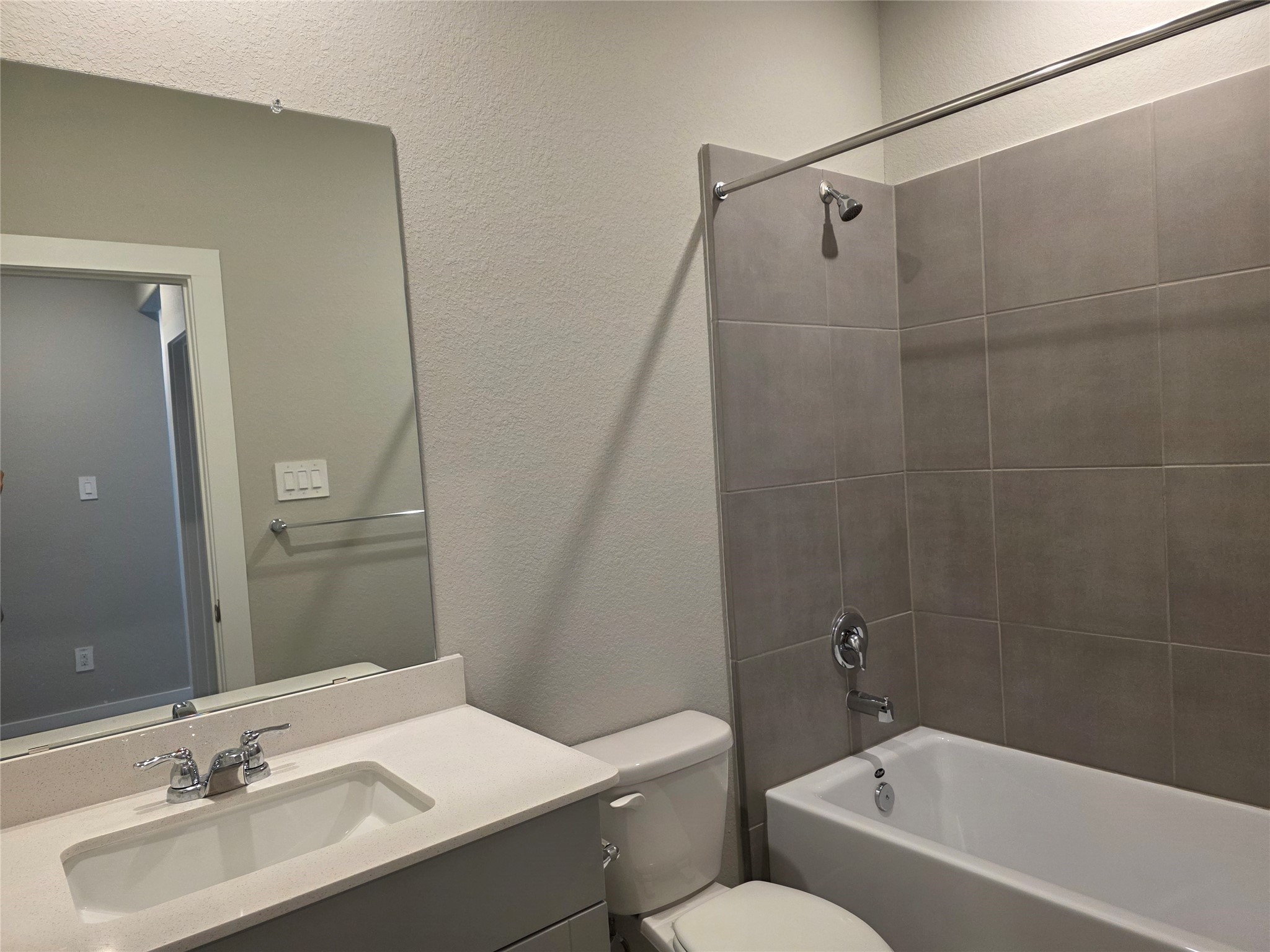 4114 Glowing Hearth Drive Houston, TX 77080 - Photo 12 of 14 a bathroom with a sink toilet and shower