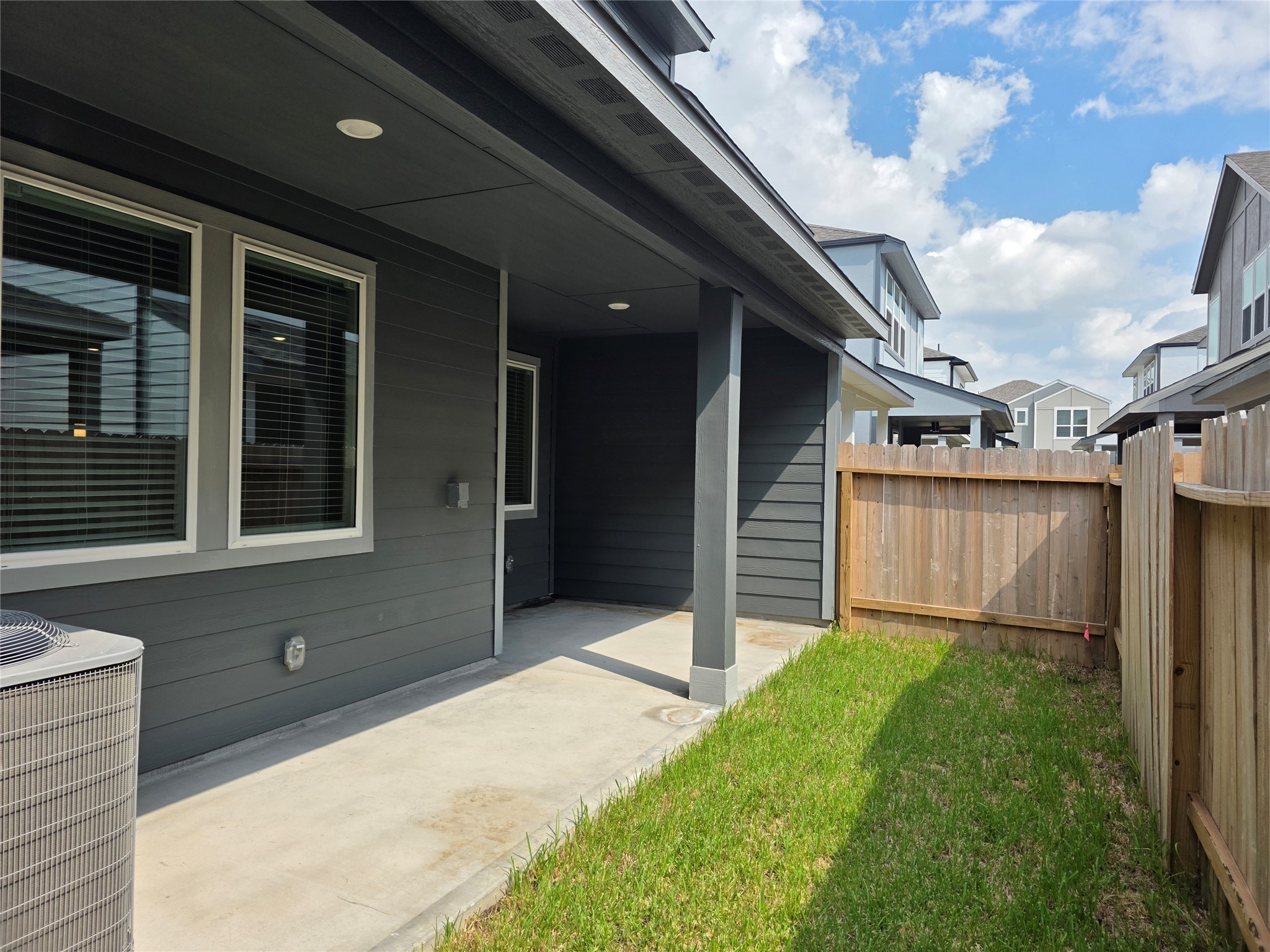 4114 Glowing Hearth Drive Houston, TX 77080 - Photo 13 of 14 a front view of a house with a yard