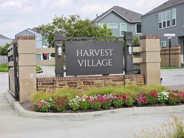 a view of front of house with flowers