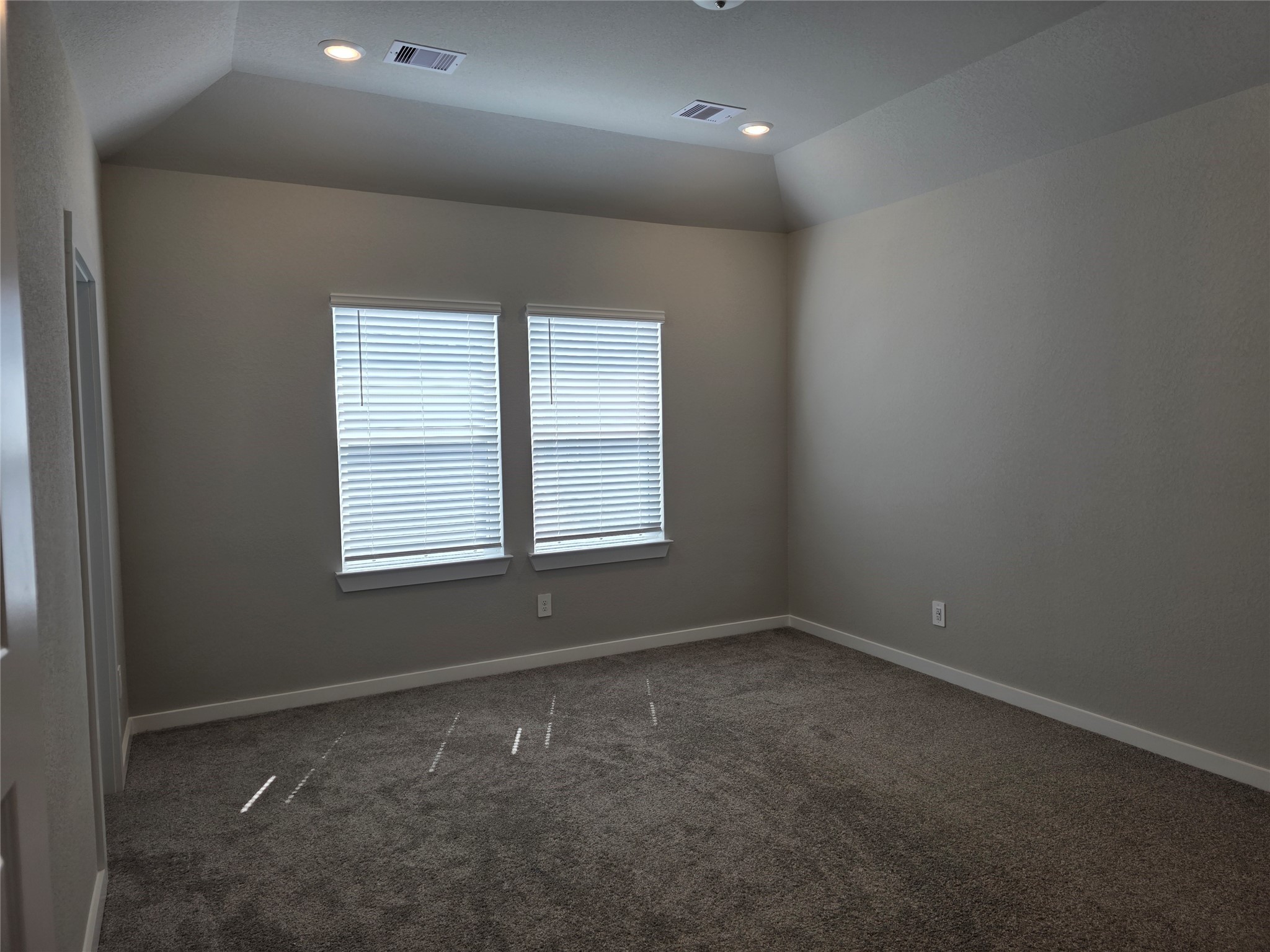 4114 Glowing Hearth Drive Houston, TX 77080 - Photo 9 of 14 an empty room with windows