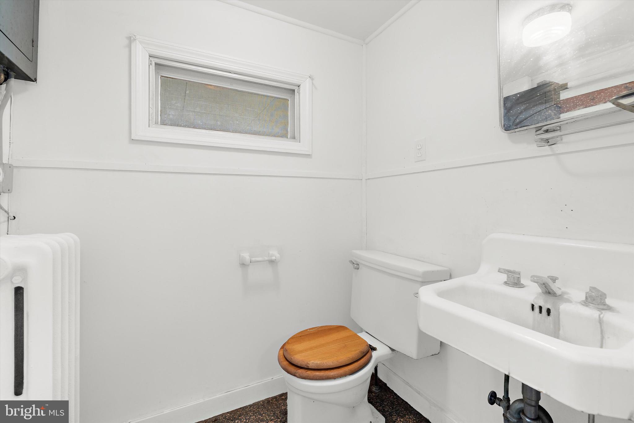 500 Nesbit Road Queenstown, MD 21658 - Photo 21 of 53 a bathroom with a toilet and a sink
