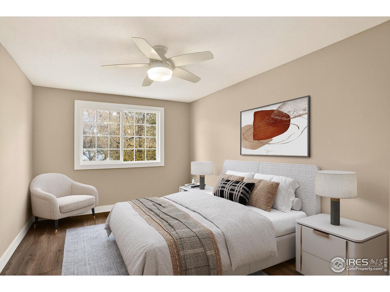 3360 34th Street, Unit B Boulder, CO 80301 - Photo 11 of 22 a bedroom with a bed and a couch