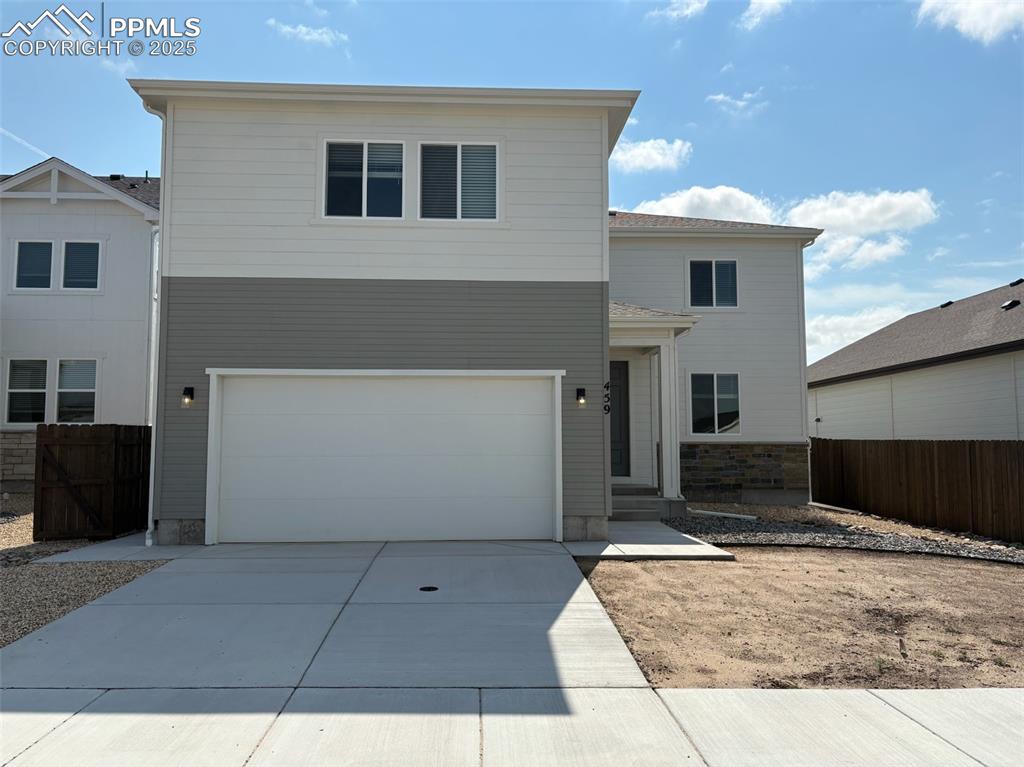 459 Atchison Way Calhan, CO 80808 - Photo 1 of 11 a view of a backyard of the house