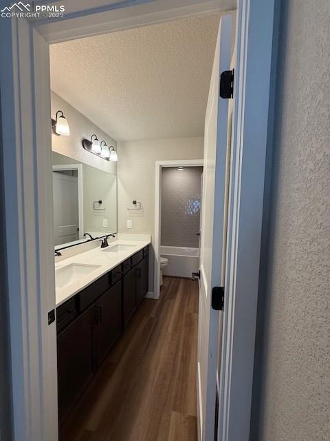 459 Atchison Way Calhan, CO 80808 - Photo 10 of 11 a large bathroom with a double vanity sink and mirror