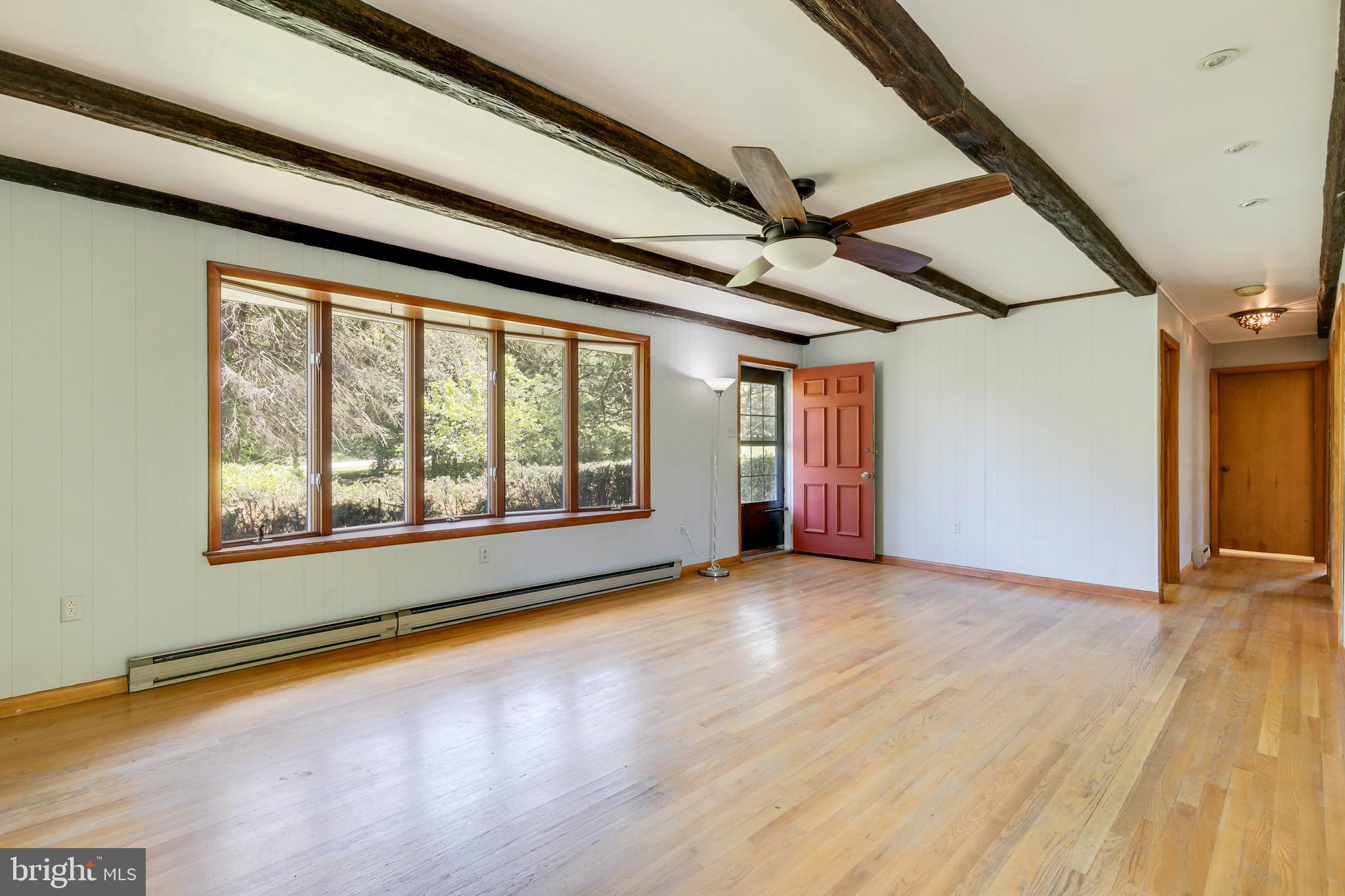2806 Murkle Road Westminster, MD 21158 - Photo 3 of 43 Large, bright living room with exposed beams