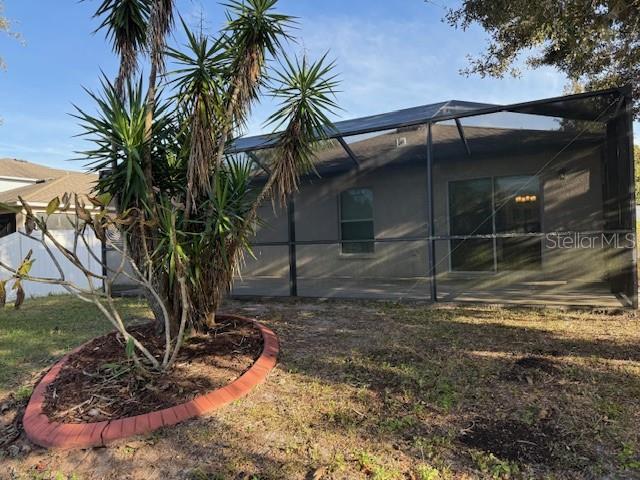 12311 Boot Spur Way Spring Hill, FL 34610 - Photo 25 of 25 front view of a house with a yard