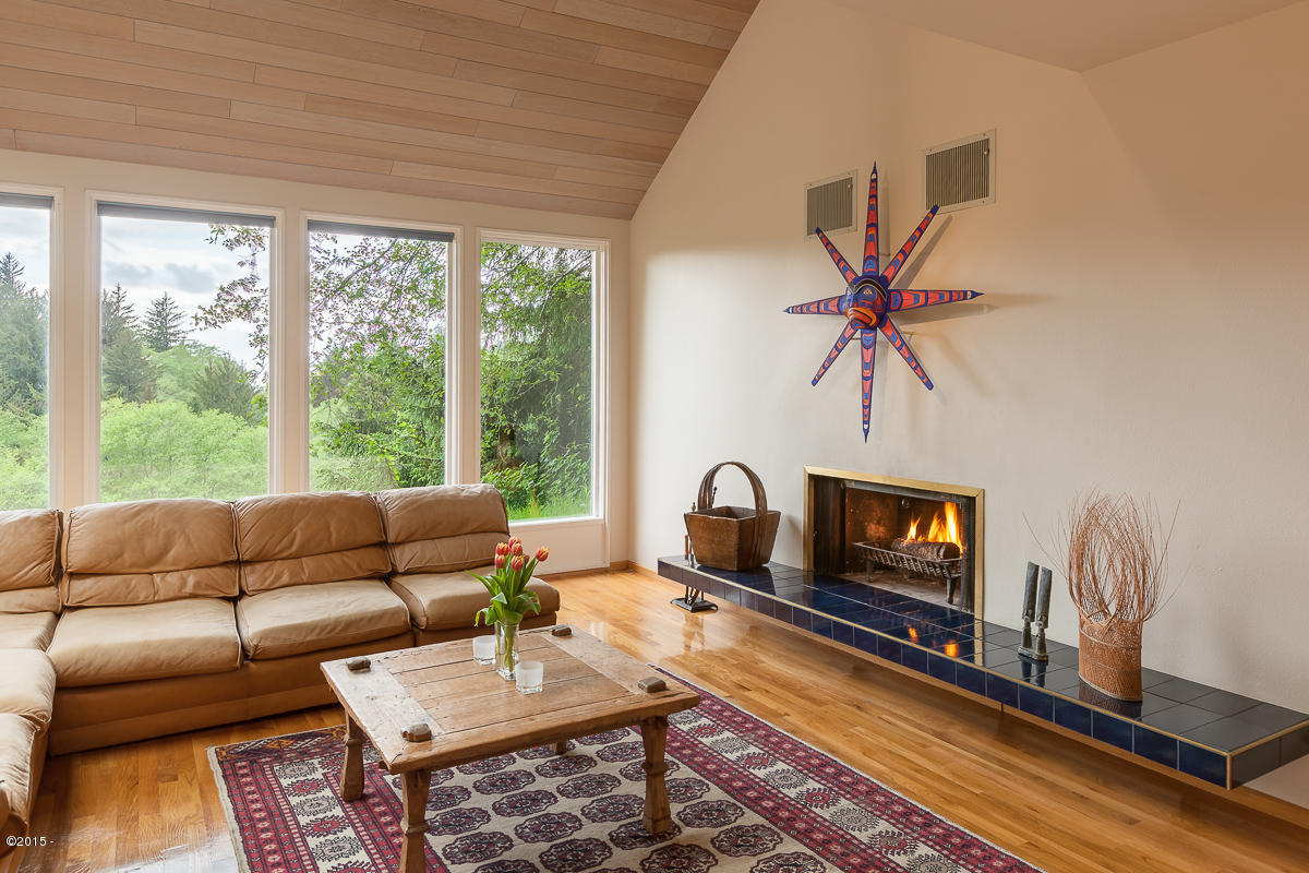 3665 Ridge Road Otis, OR 97368 - Photo 3 of 20 Living room fireplace