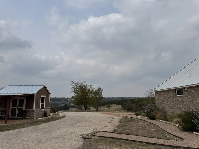 a view of swimming pool with a yard