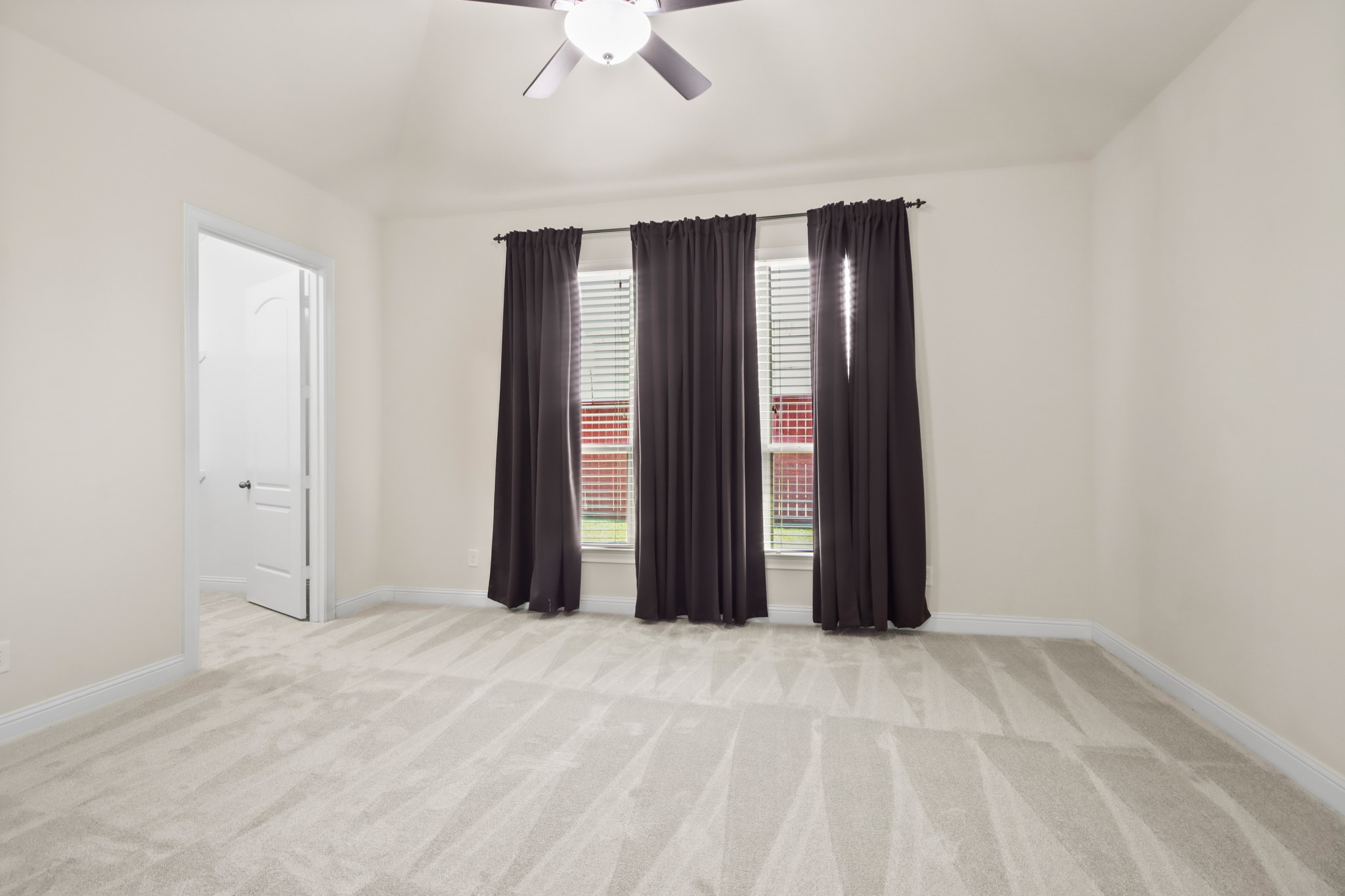 8931 Leaning Hollow Lane Spring, TX 77379 - Photo 15 of 38 View of the Primary Bedroom from the Primary Bathroom.