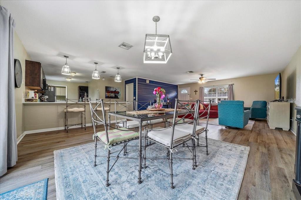 685 Northwest 67th Place Ocala, FL 34475 - Photo 12 of 33 a view of a dining room with furniture