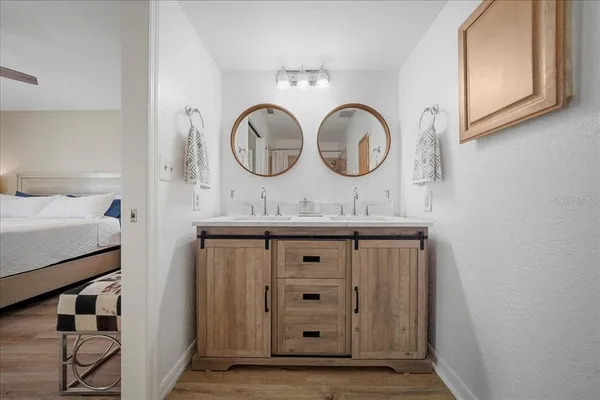 a bathroom with a sink and a mirror