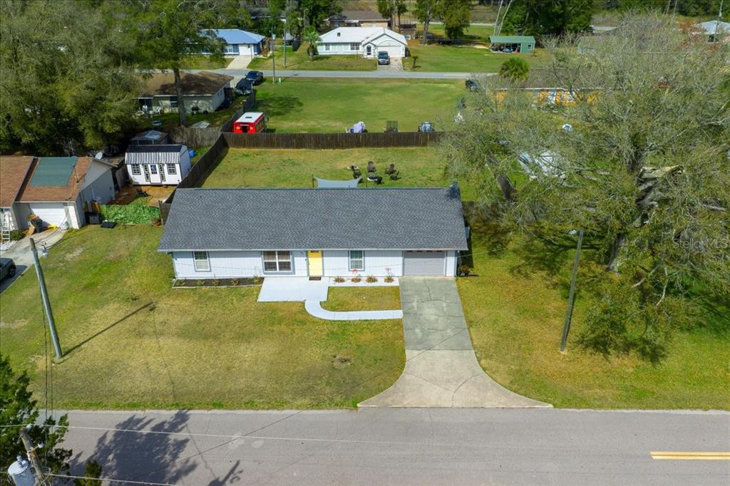 685 Northwest 67th Place Ocala, FL 34475 - Photo 31 of 33 an aerial view of a house with swimming pool