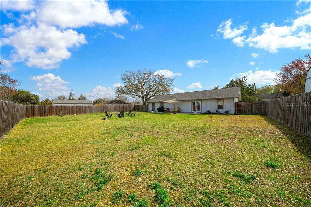 685 Northwest 67th Place Ocala, FL 34475 - Photo 5 of 33 a front view of house with yard and lake