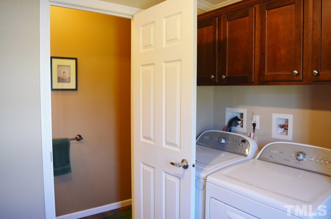 747 Glover Road Dunn, NC 28334 - Photo 20 of 25 a utility room with dryer and washer