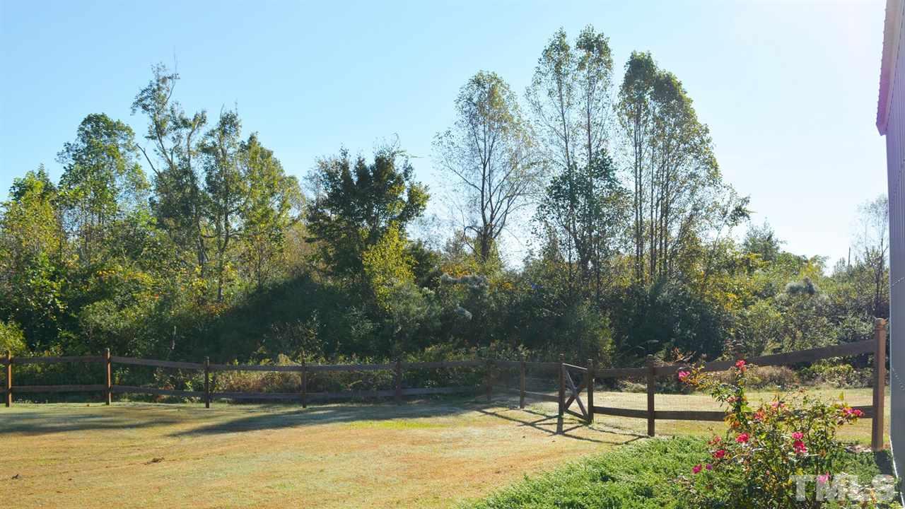 747 Glover Road Dunn, NC 28334 - Photo 23 of 25 a view of a lake view
