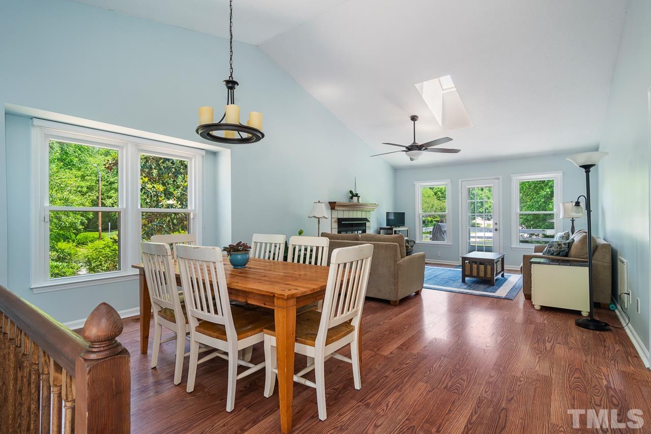 1426 Mapleside Court Raleigh, NC 27609 - Photo 2 of 38 a view of a dining room with furniture window and wooden floor