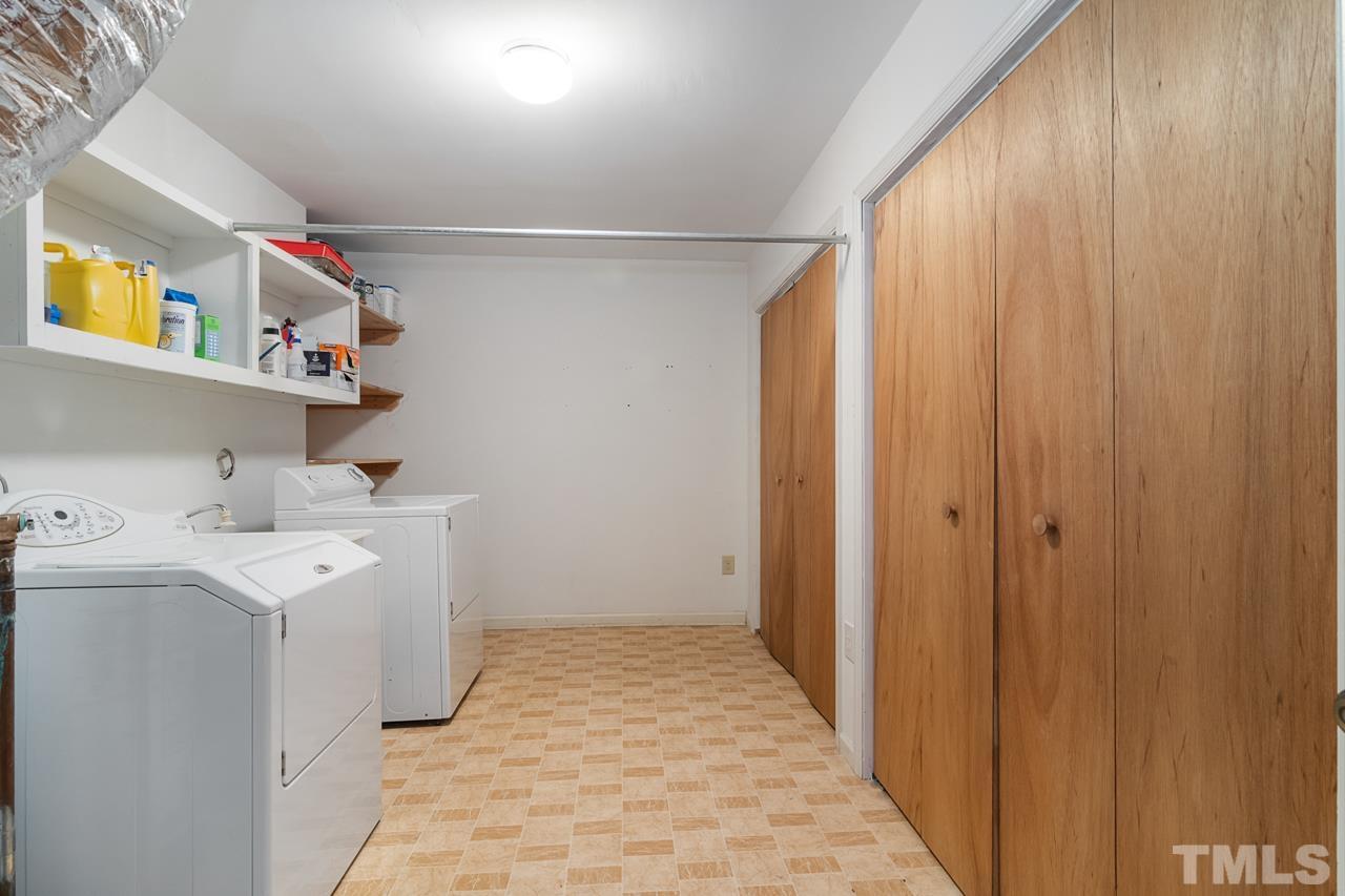 1426 Mapleside Court Raleigh, NC 27609 - Photo 21 of 38 a view of a storage & utility room with a sink