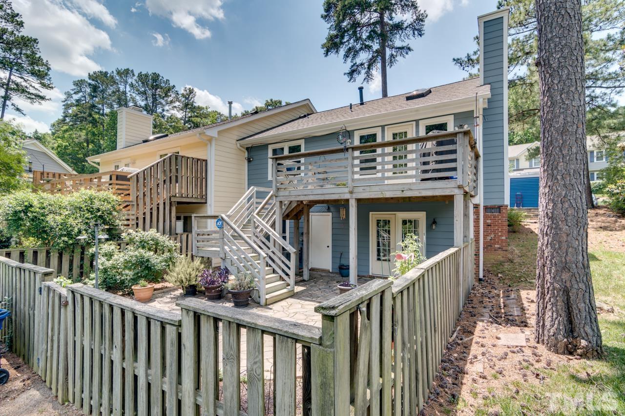 1426 Mapleside Court Raleigh, NC 27609 - Photo 32 of 38 a view of a house with wooden fence