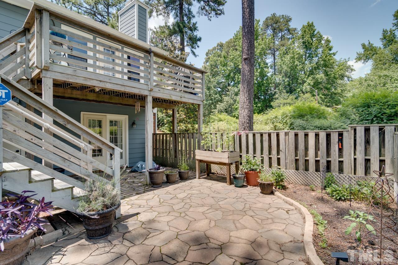 1426 Mapleside Court Raleigh, NC 27609 - Photo 34 of 38 a view of a chair and table in the patio