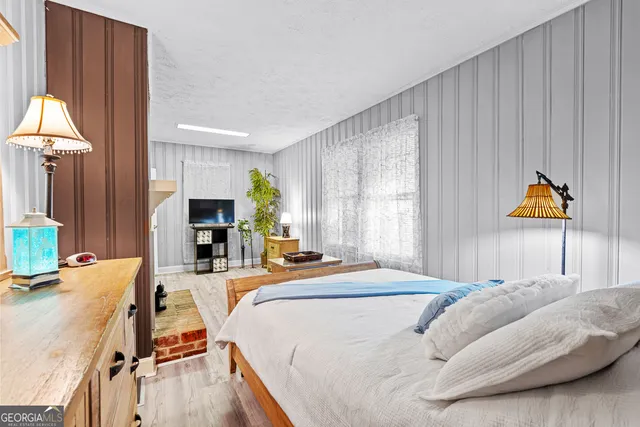 a view of an entryway with wooden floor