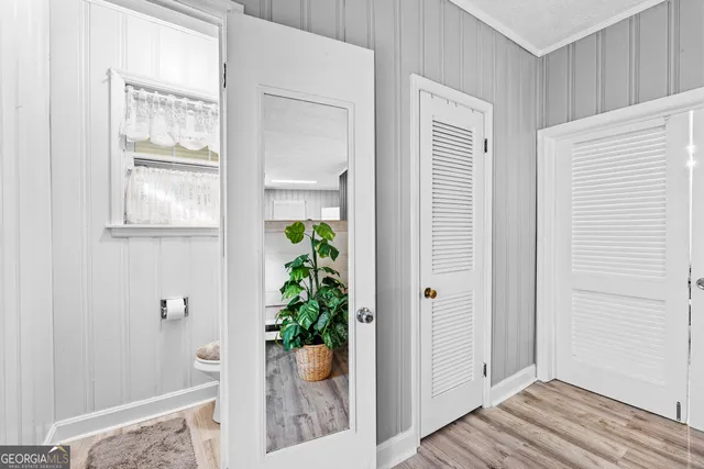 a bathroom with a toilet and a sink