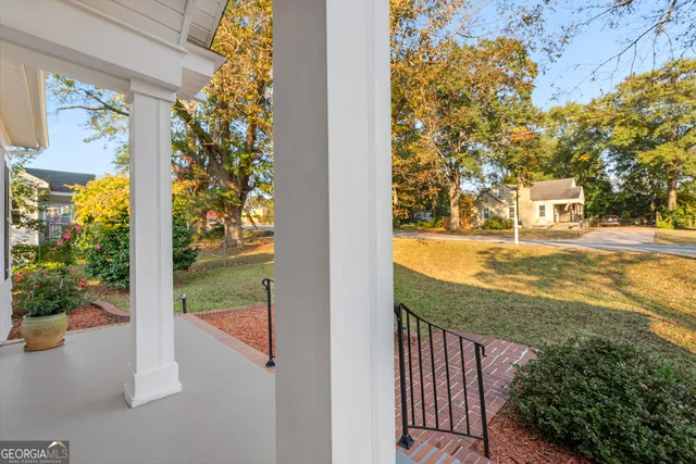 a view of a balcony with an ocean view