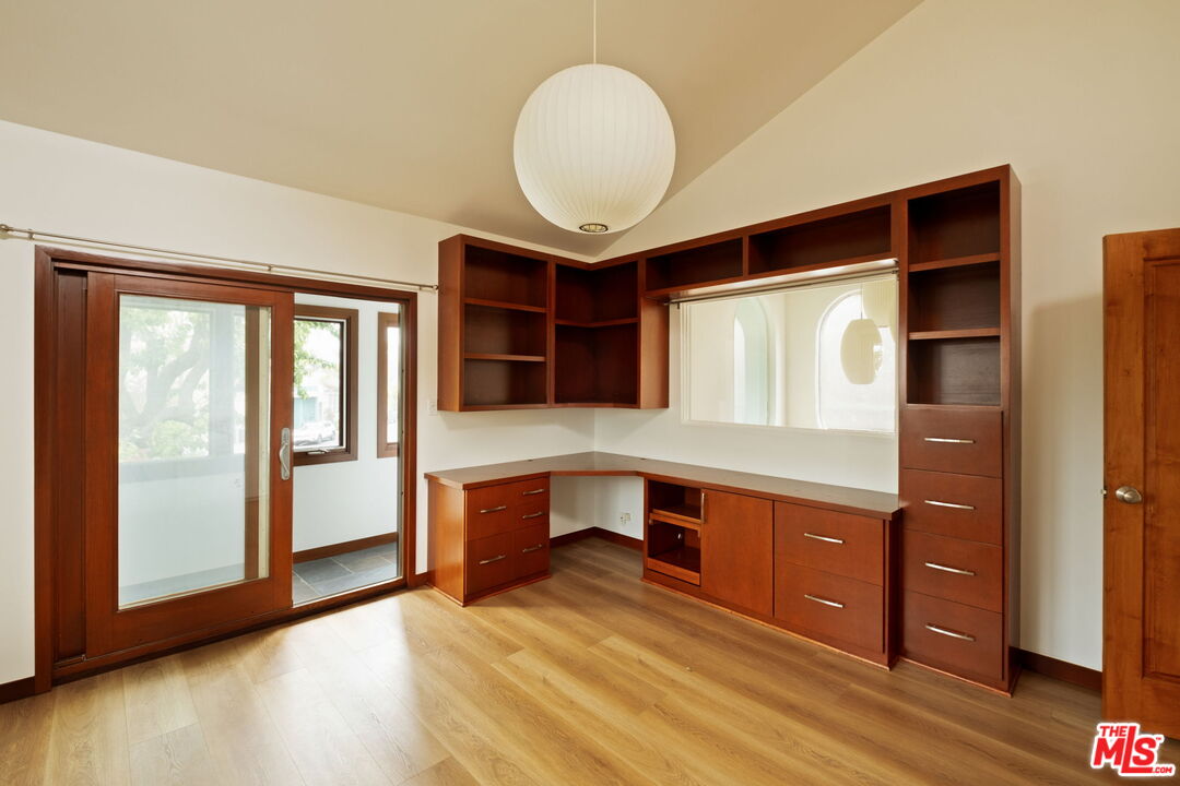 2325 Abbot Kinney Boulevard Venice, CA 90291 - Photo 19 of 32 a view of a room with a dresser and mirror