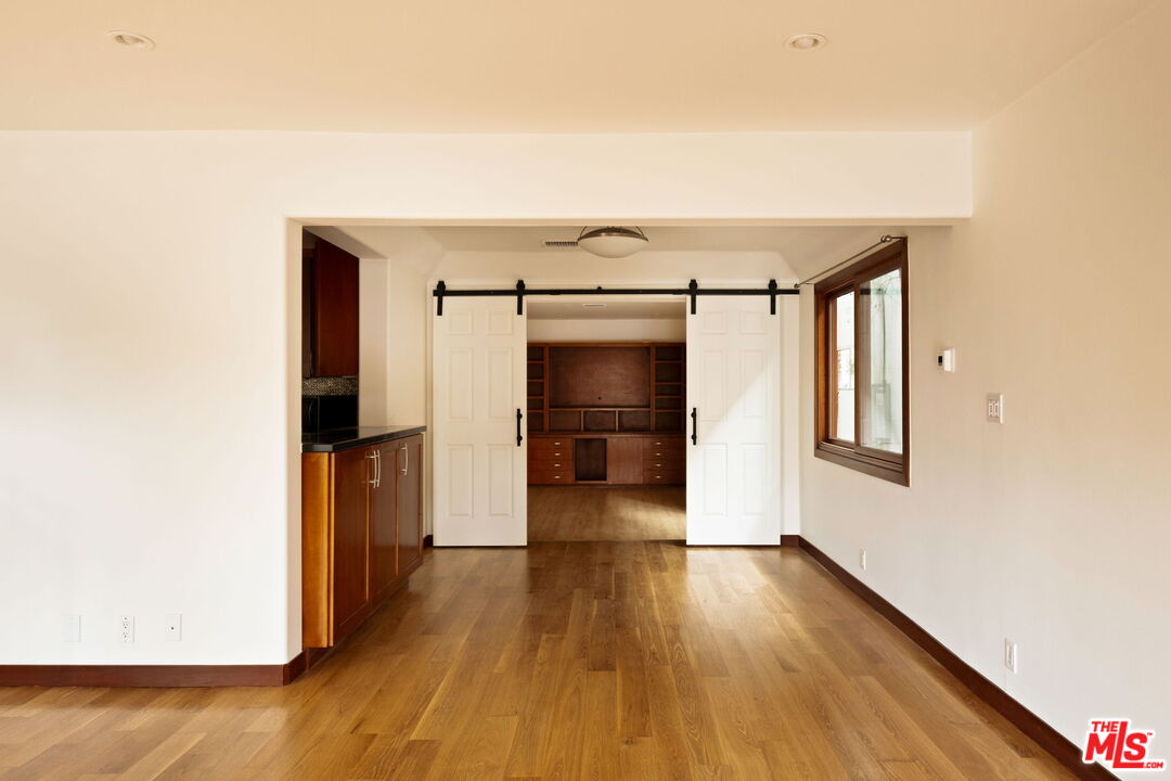 2325 Abbot Kinney Boulevard Venice, CA 90291 - Photo 9 of 32 a view of hallway with wooden floor