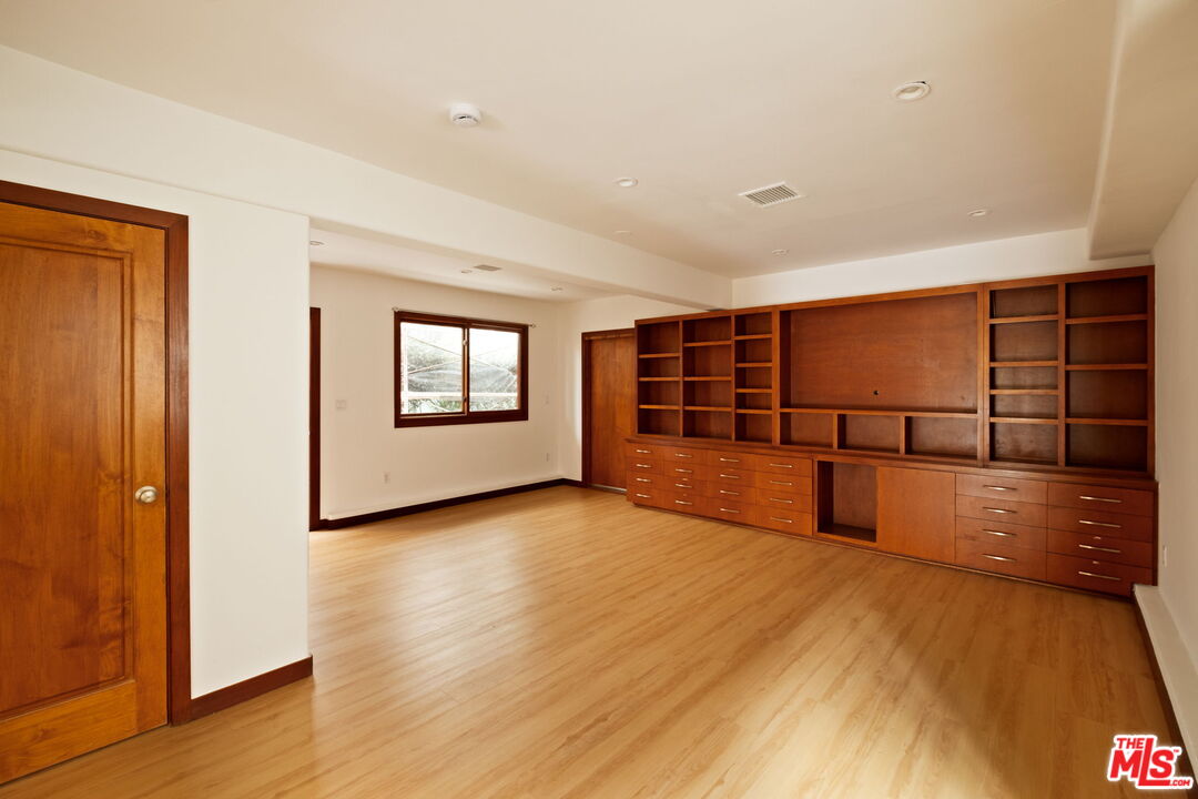 2325 Abbot Kinney Boulevard Venice, CA 90291 - Photo 10 of 32 a view of a room with wooden floor and windows