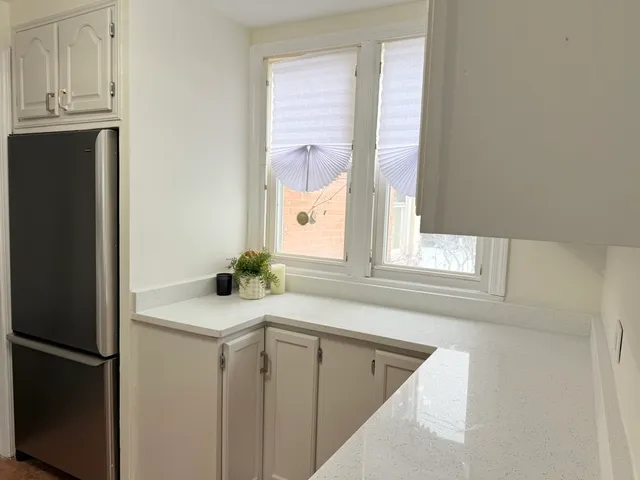 a kitchen with a stove and a microwave