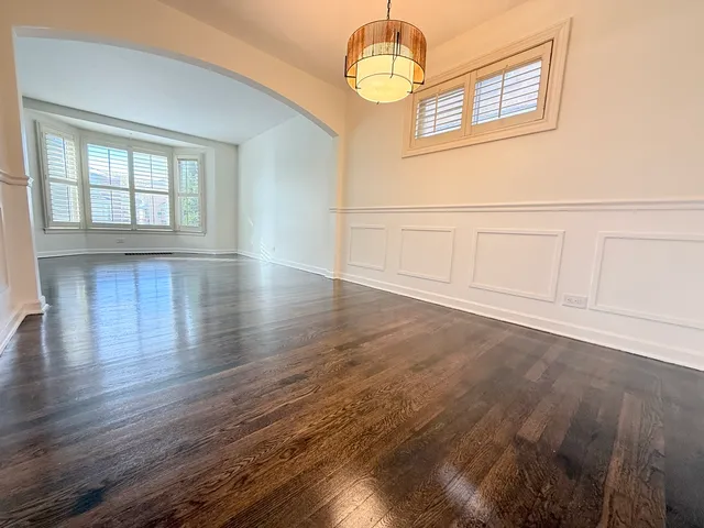 a bedroom with bed and a window