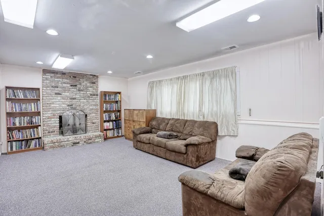 a living room with furniture and a couch