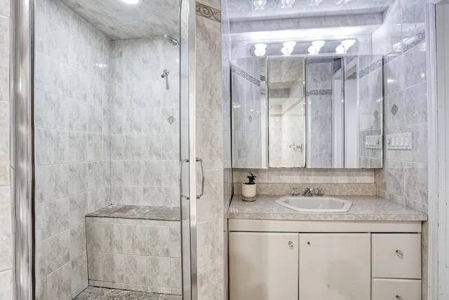 a view of a house with a yard and garage