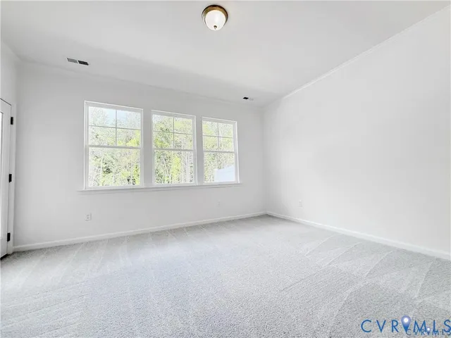 an empty room with windows