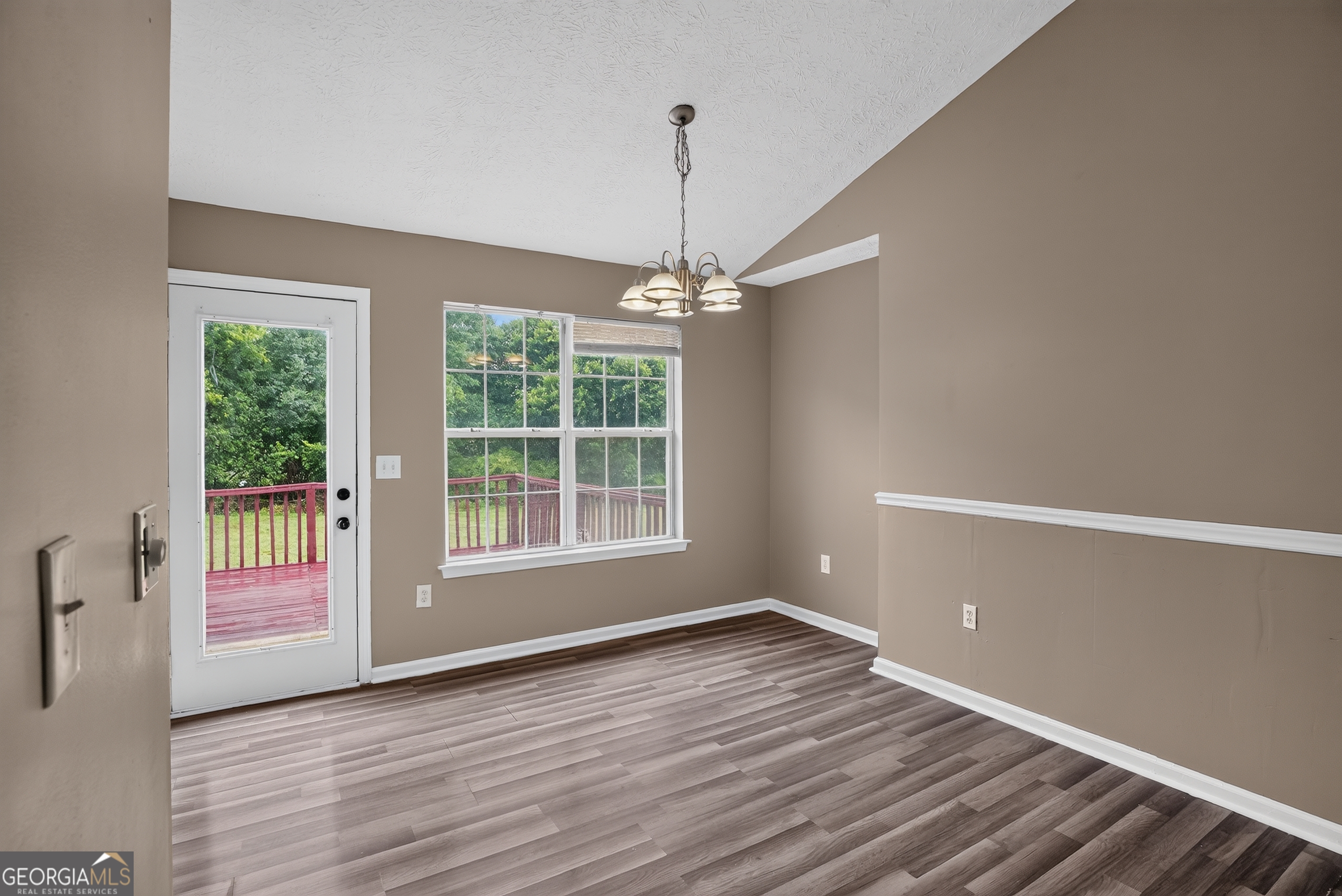 75 Linsley Way Covington, GA 30016 - Photo 28 of 48 a view of a room with window wooden floor and front door