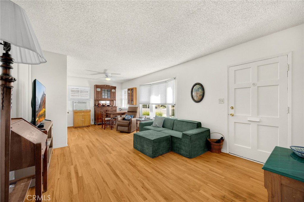 4577 Ranger Avenue El Monte, CA 91731 - Photo 6 of 25 a living room with furniture and a flat screen tv