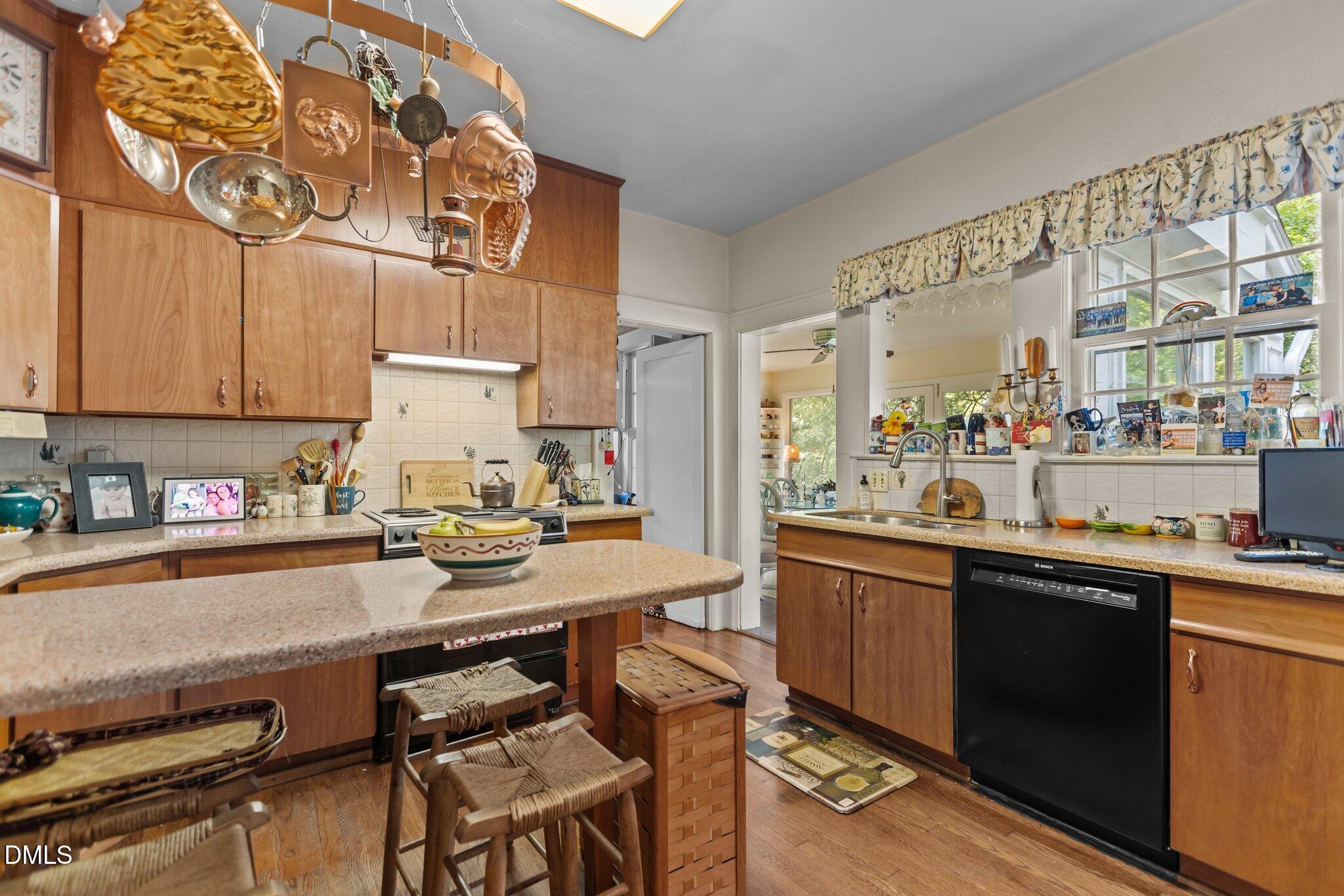 3724 Hope Valley Road Durham, NC 27707 - Photo 11 of 55 a kitchen with a sink and cabinets