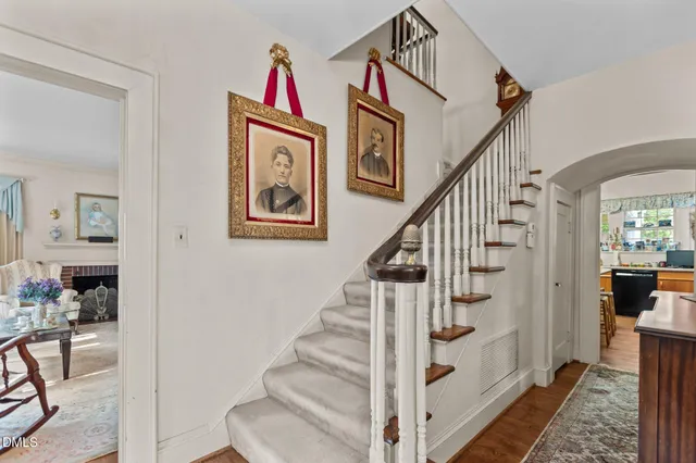 a bed room with a bed and a large window