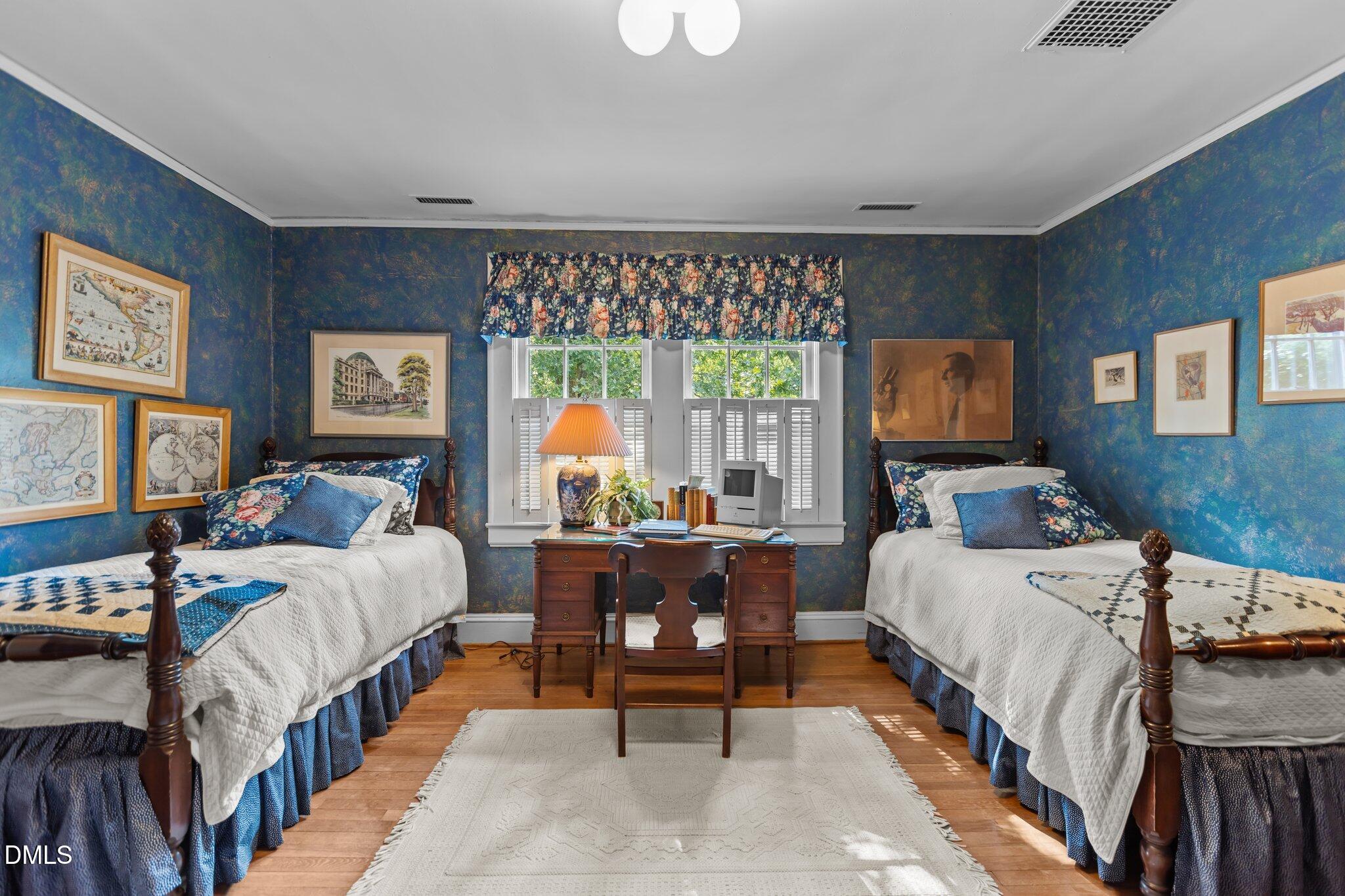 3724 Hope Valley Road Durham, NC 27707 - Photo 21 of 55 a bed room with a bed and a large window