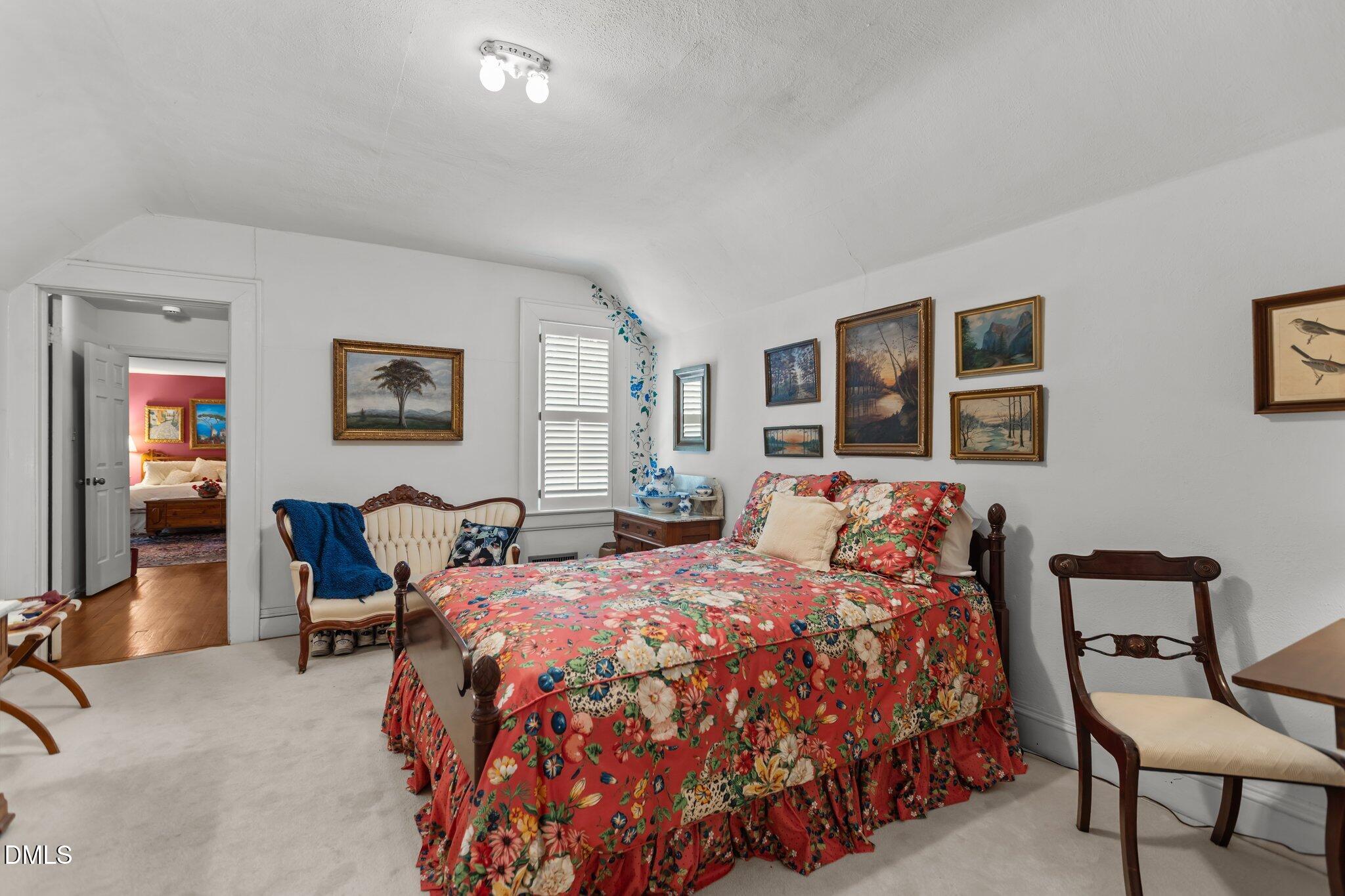3724 Hope Valley Road Durham, NC 27707 - Photo 29 of 55 a bed room with a bed and chair
