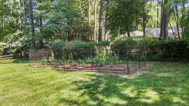 a backyard of a house with lots of green space