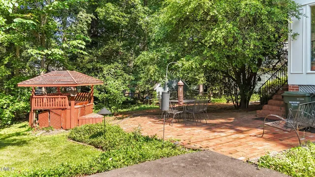 a backyard of a house with lots of green space