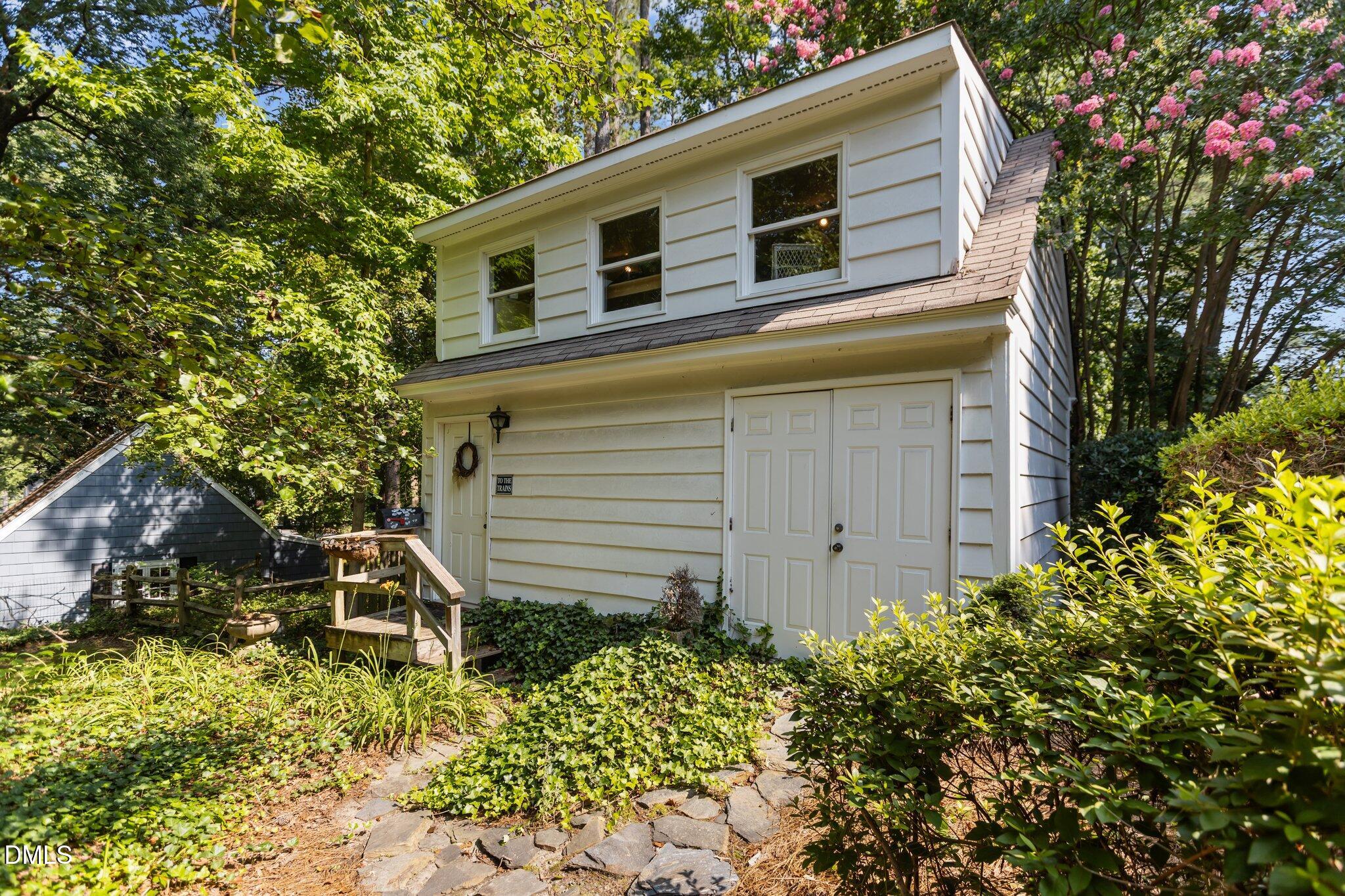 3724 Hope Valley Road Durham, NC 27707 - Photo 45 of 55 a backyard of a house with lots of green space