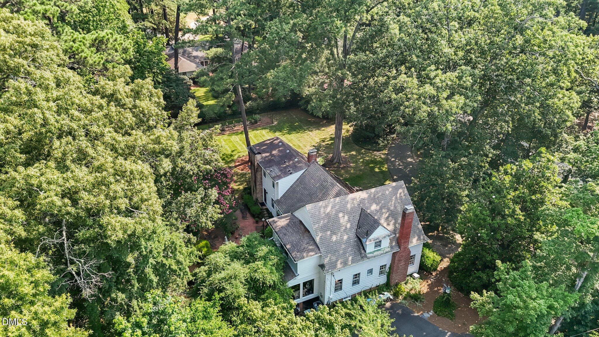 3724 Hope Valley Road Durham, NC 27707 - Photo 52 of 55 an aerial view of a house with a yard and tree s