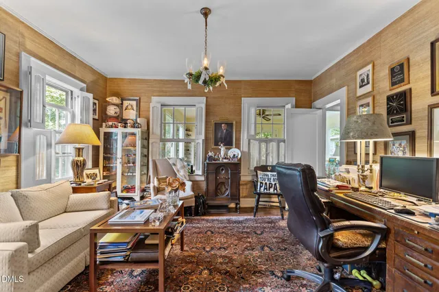 a view of a livingroom with furniture and window
