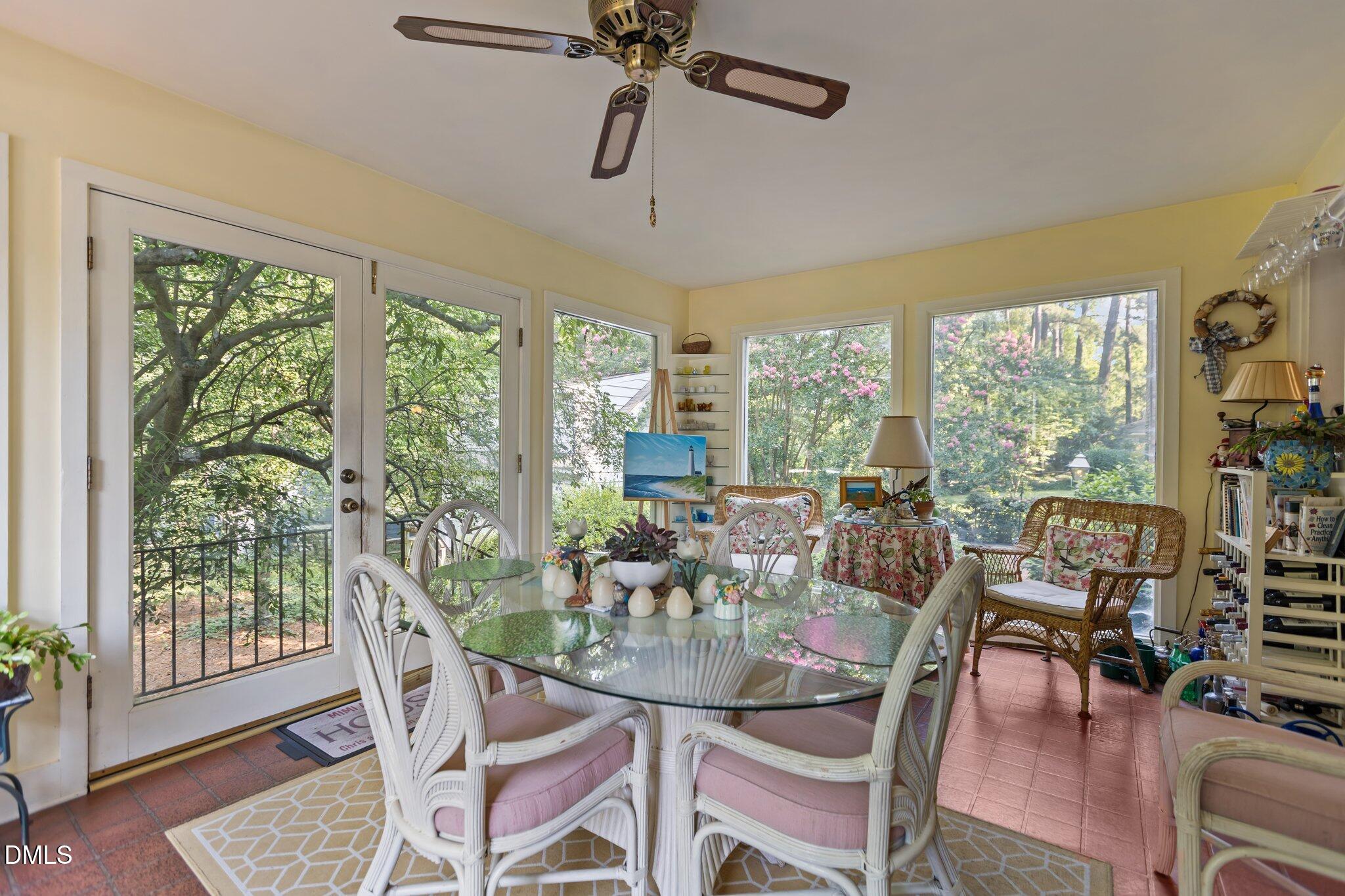 3724 Hope Valley Road Durham, NC 27707 - Photo 9 of 55 a view of a dining room with furniture window and wooden floor
