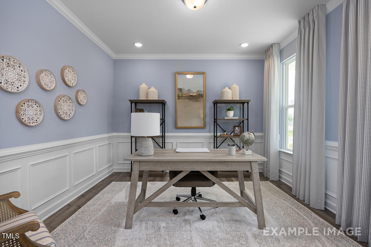 297 Crop Road Angier, NC 27501 - Photo 5 of 23 a view of a room with furniture and wooden floor