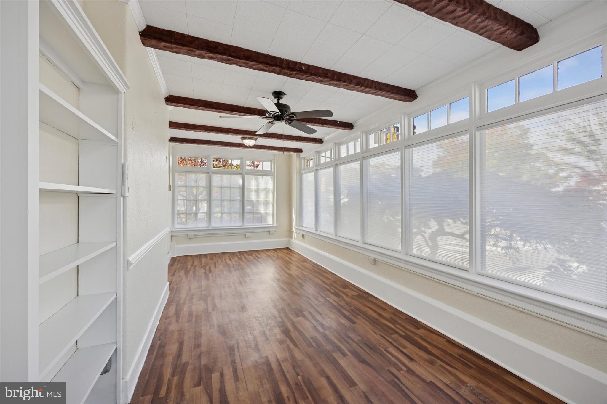 21 South Clinton Street, Unit 1 Doylestown, PA 18901 - Photo 11 of 14 Bright, airy space with charming beams.