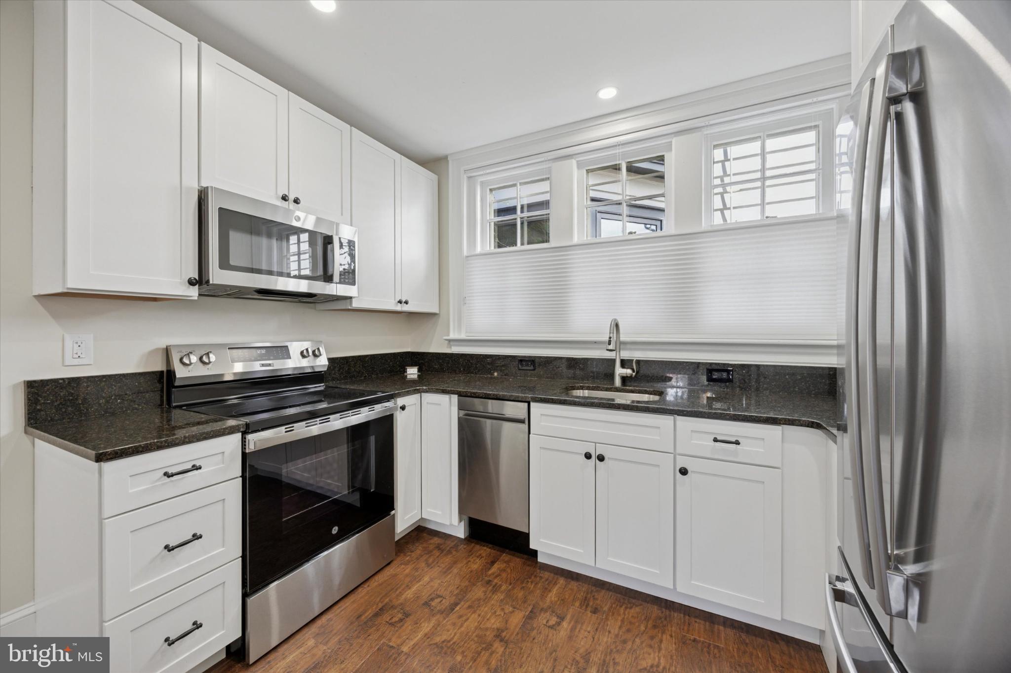 21 South Clinton Street, Unit 1 Doylestown, PA 18901 - Photo 6 of 14 Modern kitchen with sleek finishes.